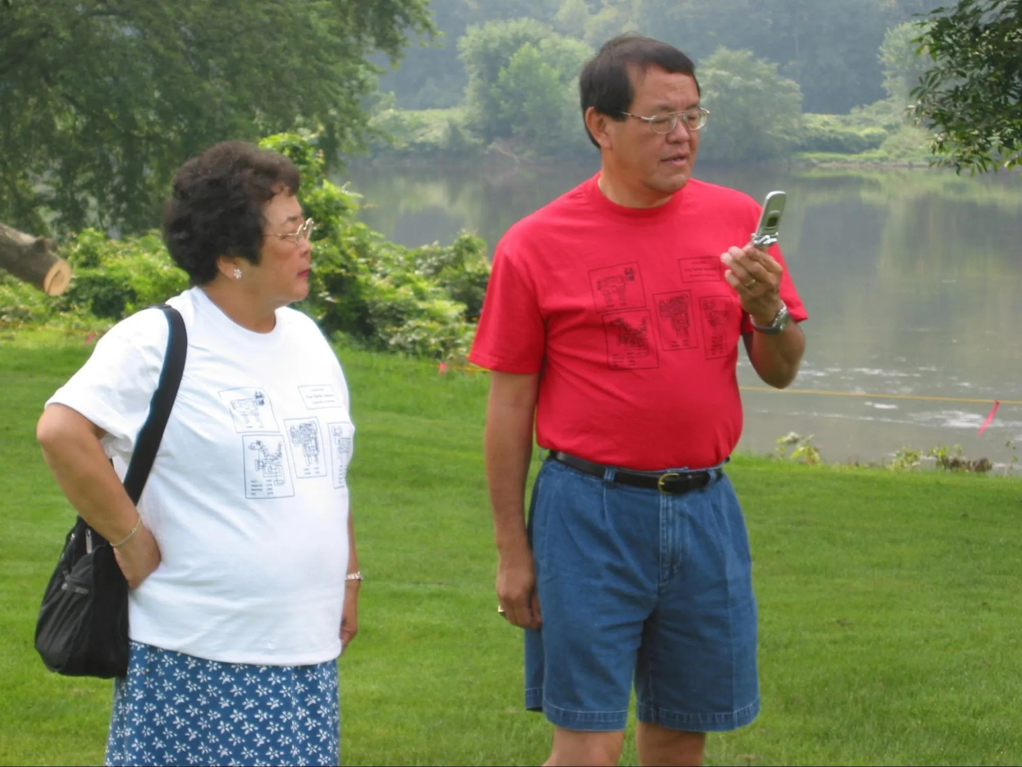 Early adopter Baba using a flip phone while older sister Aunt Helen seems dubious.